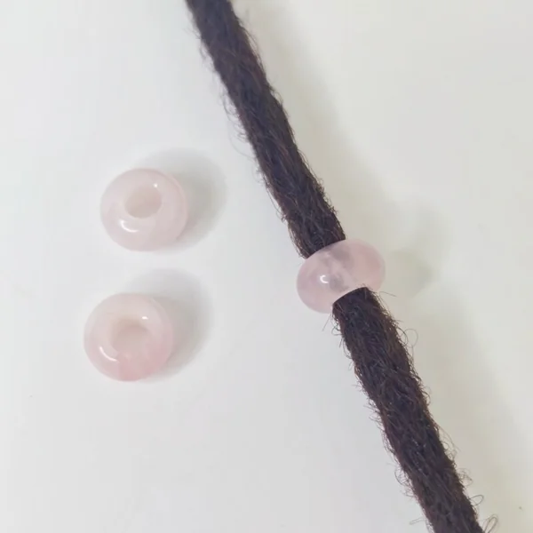 Abalorio de cuarzo rosa